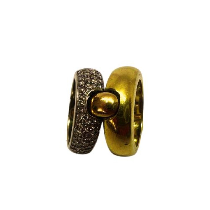 Double anneau en or jaune et gris 750 millièmes (18K), le second étant pavé d'environ 65 diamants en brillant 0,02cts et en sert