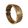 Bracelet manchette en or jaune 750 millièmes (18K) à décor ciselé et ajouré de feuilles stylisées. Fermoir à cliquet (chaînette 