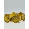 Bracelet articulé en or jaune 750 millièmes (18K) composé de six pièces de 10 francs NAPOLEON III années 1867/64/63 (X2)/62/66. 