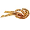 Broche noeud en or jaune 750 millièmes (18K) à maille tressée sertie de quatre diamants en brillant 0,07cts chacun environ. Poid