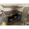 1 table chef en inox (en mauvais état)