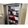 1 armoire haute en métal ouvrant à porte coulissante