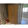 1 armoire ouvrant à portes coulissantes